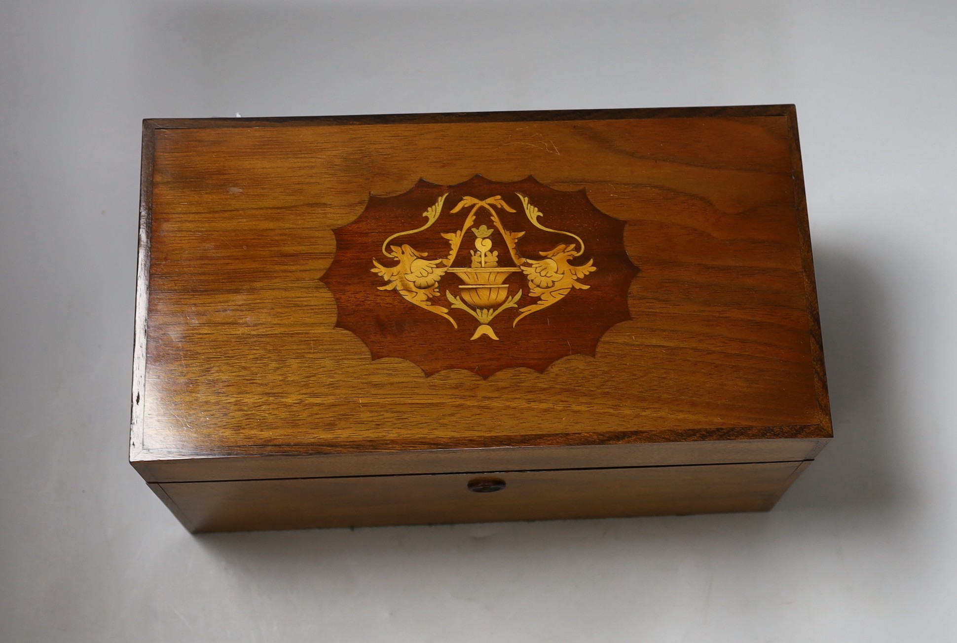 A 19th century with later inlay mahogany tea caddy, 31cms wide, 16cms high